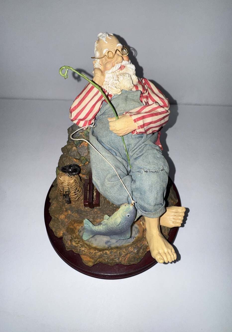 Christmas Around the World House of Lloyd Santa’s  Day off Fishing Figurine